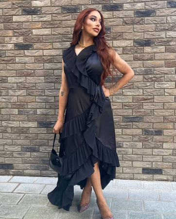 Munroe Bergdorf wears the AW19 Ayla Wrap Maxi Dress