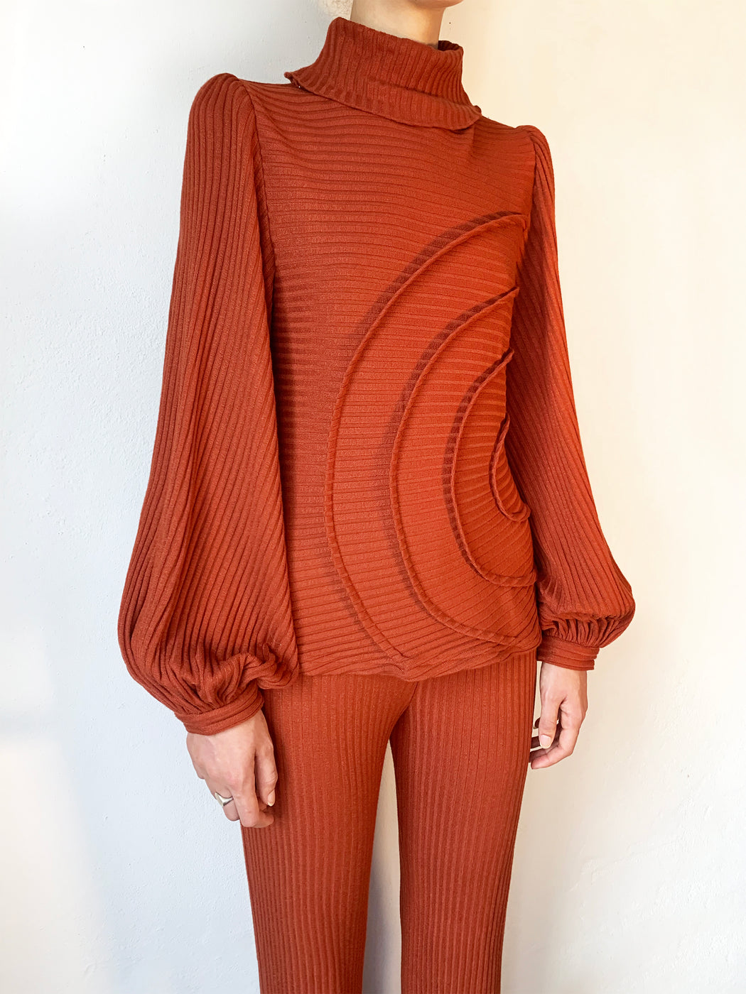 georgia hardinge serra jumper ribbed jersey knit turtleneck terracotta red orange rust puff sleeve tucks